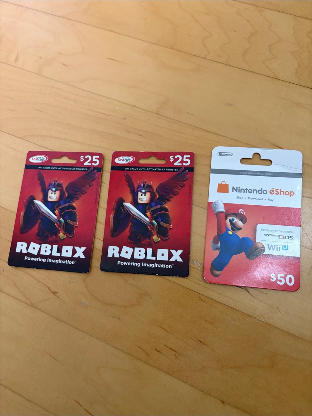 Set of 3 Gift Cards (2 $25 Roblox Gift Cards and 1 $50 Nintendo eShop Gift Card)